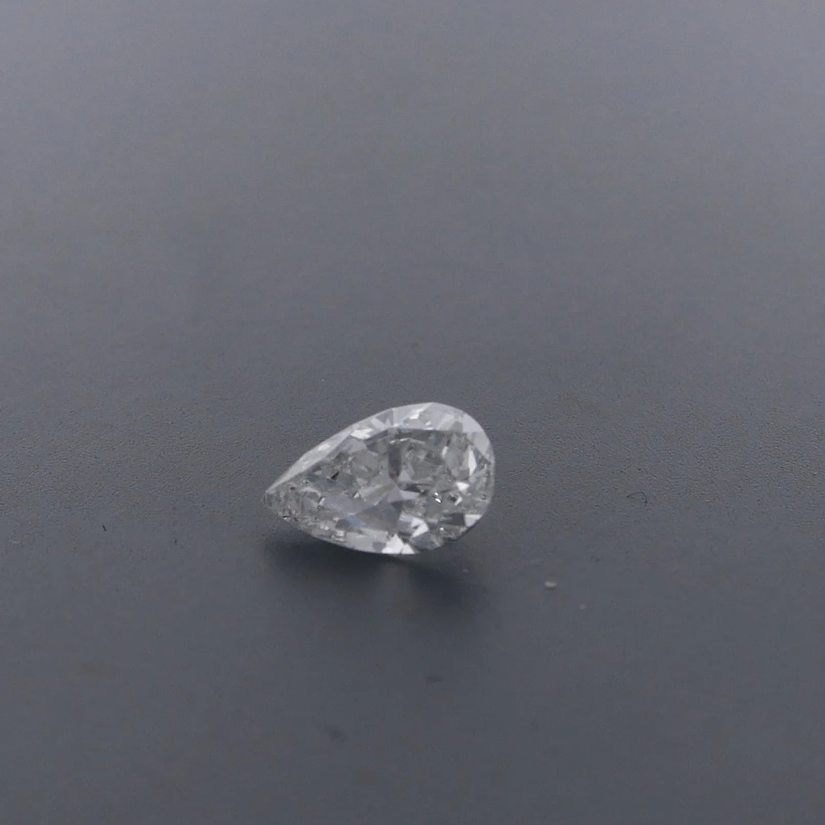 Estate Pear .81ct ESI1 Diamond