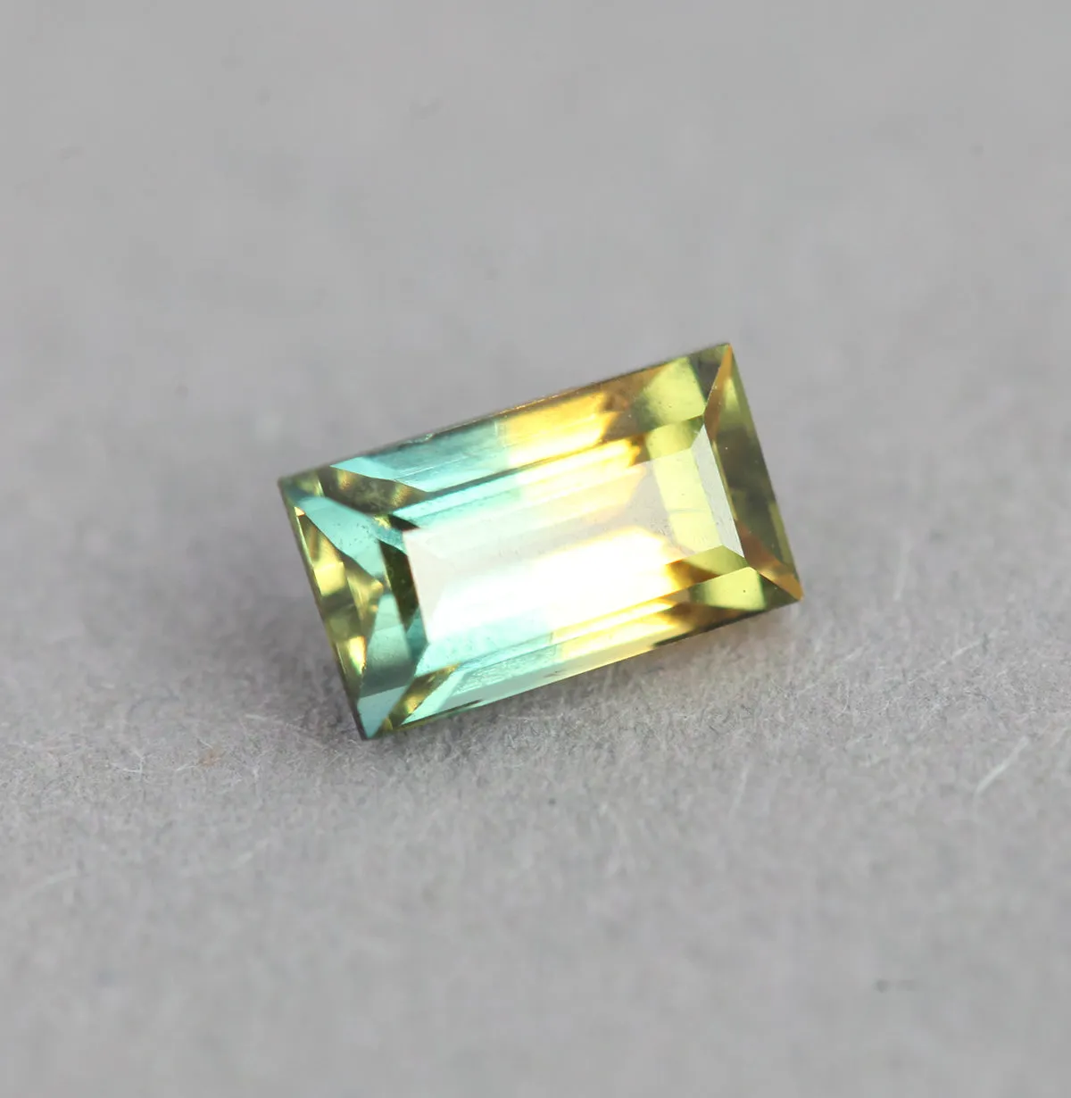 Loose 0.83 Ct Rectangle Teal And Orange Yellow Sapphire