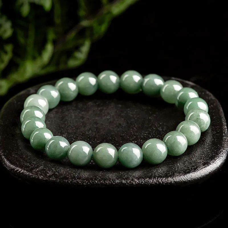 Stay Cool and Stylish with our Natural Jade Beaded Stretch Bracelet - Minimalist Design in Oil and Bit Green