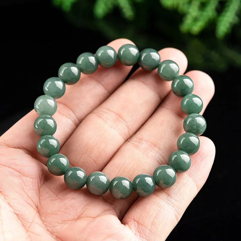 Stay Cool and Stylish with our Natural Jade Beaded Stretch Bracelet - Minimalist Design in Oil and Bit Green