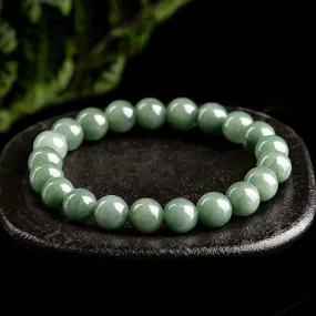 Stay Cool and Stylish with our Natural Jade Beaded Stretch Bracelet - Minimalist Design in Oil and Bit Green